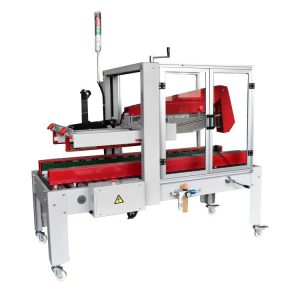 RUBBER automatic carton sealer with red flap folder under its transparent safety guard
