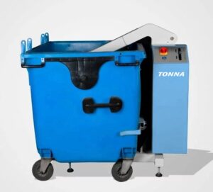 TONNA1100 bin press with a wheeled 1100-litre container on its platform